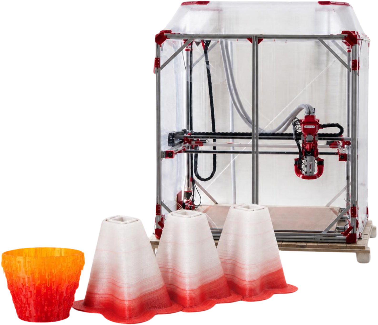 Impressora 3D de pellet Ginger G1 com o vaso e as três cúpulas impressos nela à frente